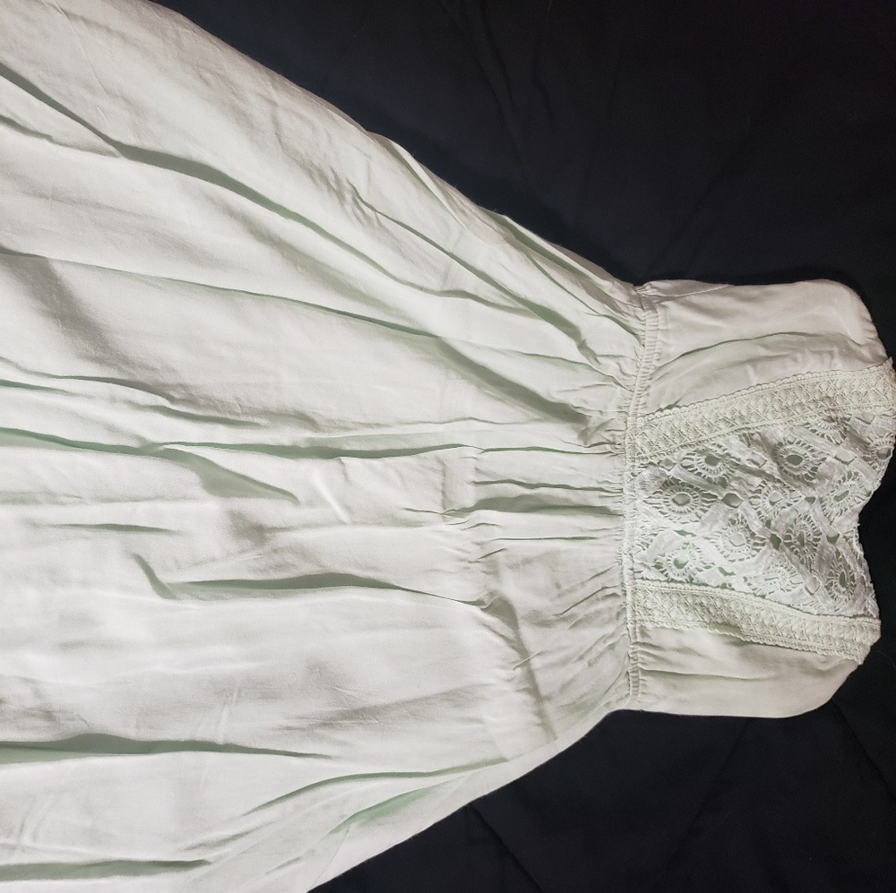 Pale green dress.